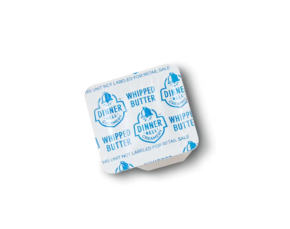 Culver’s Butter packet, creamy and rich golden spread used on buns, toast, and hot dishes for flavor