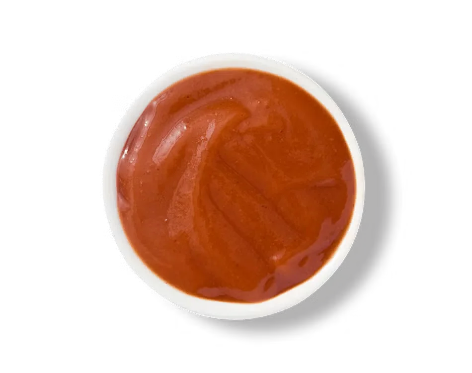 Culver’s Frank’s RedHot® Buffalo Sauce in a small cup, bold red color with spicy flavor