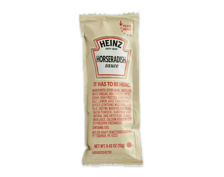 Culver’s Horseradish sauce in a small cup, creamy and white with a bold, spicy flavor