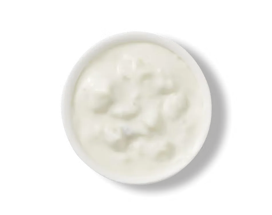 Culver’s Ken’s® Blue Cheese dressing in a small cup, thick and creamy with real blue cheese crumbles