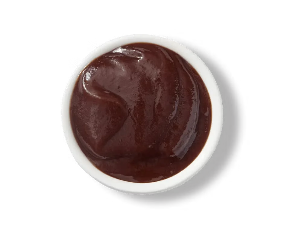Culver’s Sweet Baby Ray’s® BBQ Sauce in a small cup, thick and smoky with sweet flavor